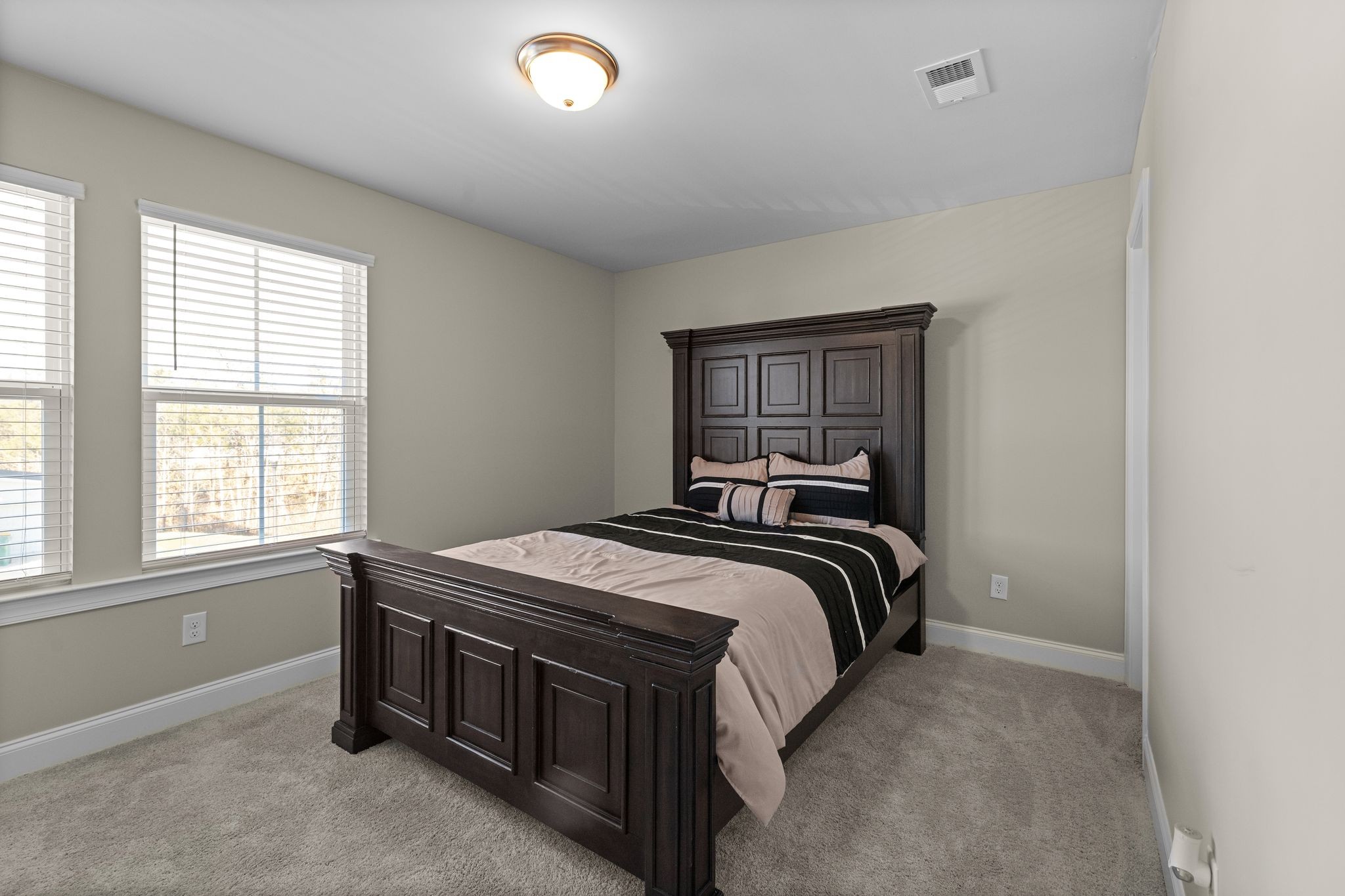 2004 Notchleaf Road Antioch, TN 37013 - Photo 16 of 19 a bedroom with a bed and a window