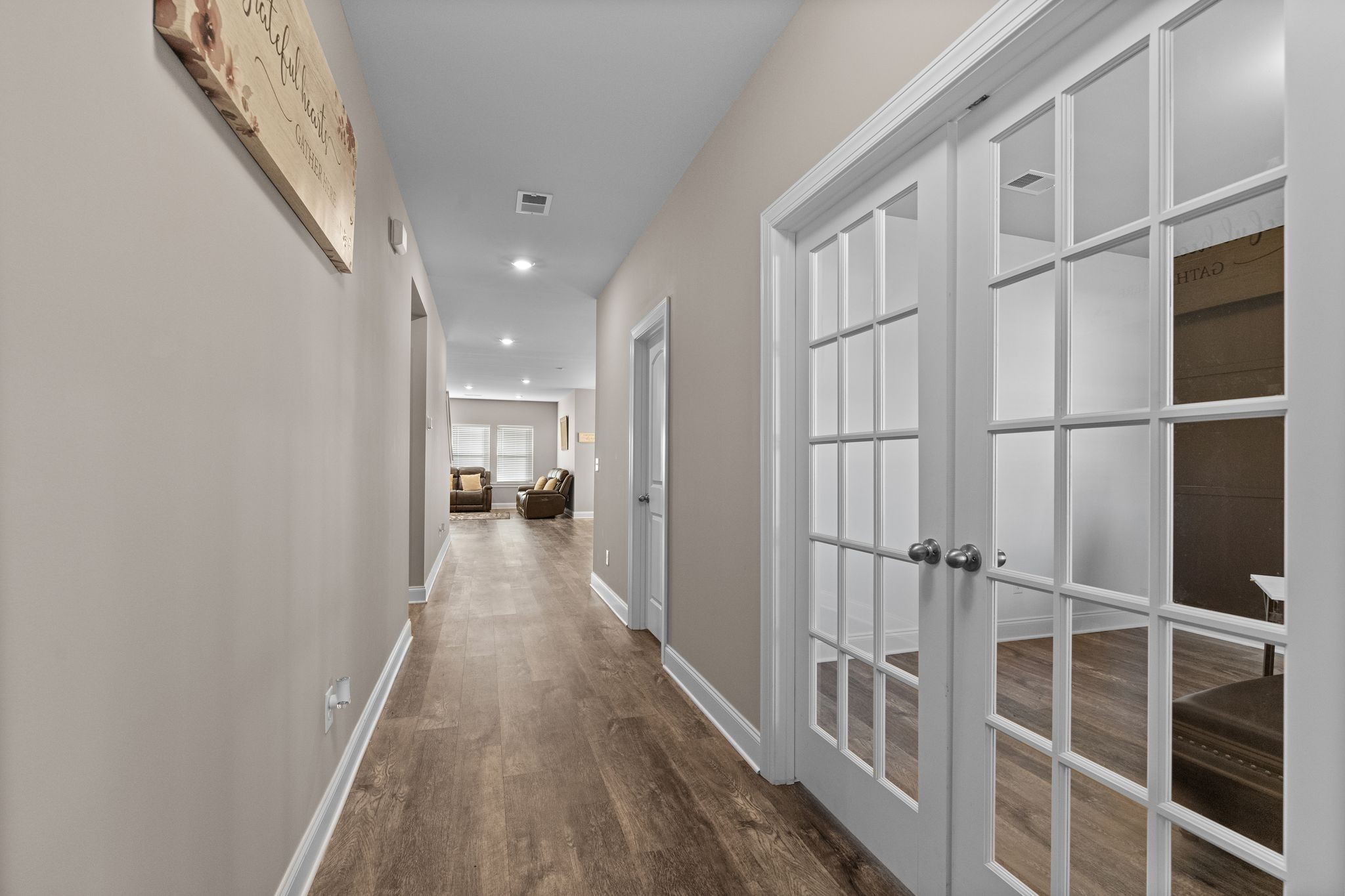 2004 Notchleaf Road Antioch, TN 37013 - Photo 5 of 19 a view of a hallway with wooden floor and windows