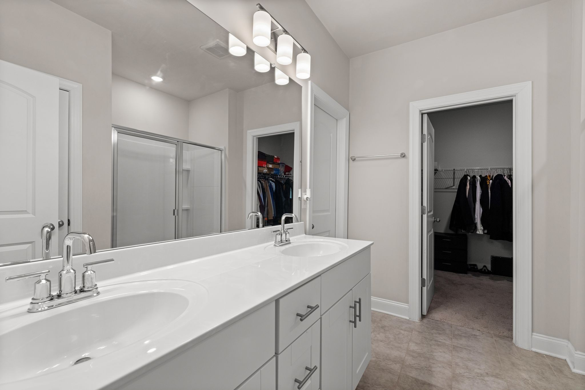 2004 Notchleaf Road Antioch, TN 37013 - Photo 10 of 19 a bathroom with a sink double vanity and a shower
