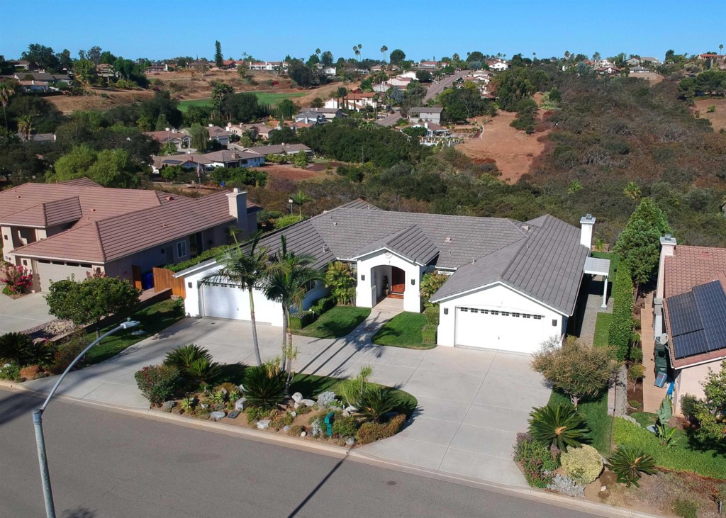 28288 Deep Canyon Drive Escondido, CA 92026 - Photo 3 of 75 an aerial view of multiple houses with a street