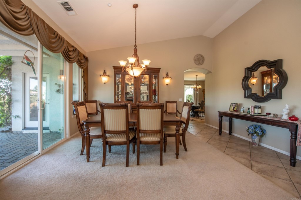28288 Deep Canyon Drive Escondido, CA 92026 - Photo 32 of 75 a view of a dining room with furniture and chandelier