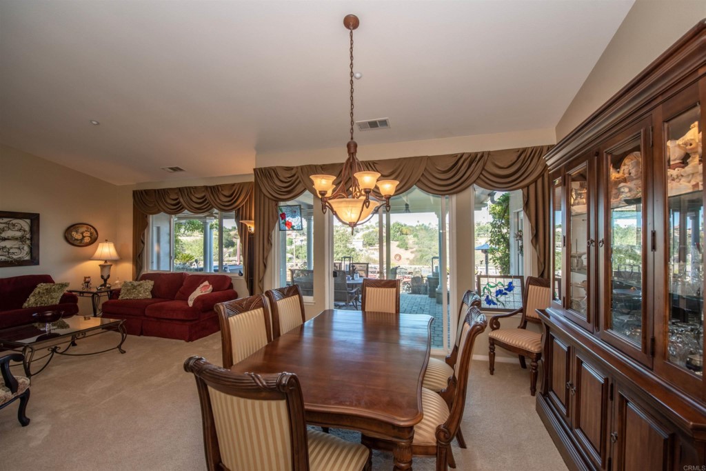 28288 Deep Canyon Drive Escondido, CA 92026 - Photo 33 of 75 a view of a dining room with furniture window and outside view