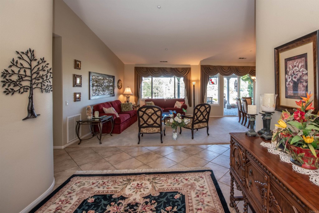 28288 Deep Canyon Drive Escondido, CA 92026 - Photo 39 of 75 a living room with furniture a window and a potted plant