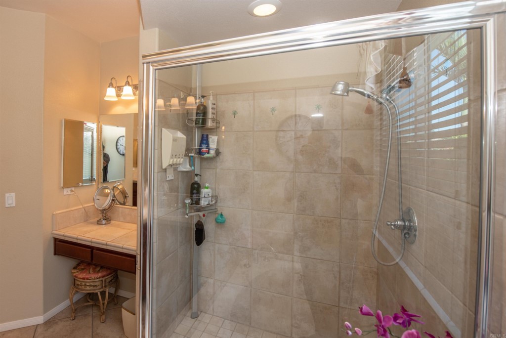 28288 Deep Canyon Drive Escondido, CA 92026 - Photo 62 of 75 a bathroom with a shower and a sink