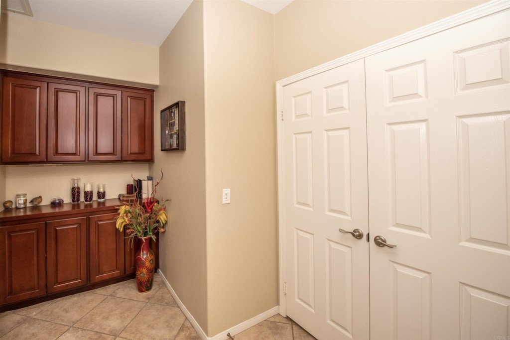 28288 Deep Canyon Drive Escondido, CA 92026 - Photo 64 of 75 a view of a storage and utility room with cabinet