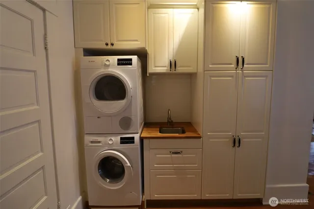 a utility room with dryer and washer