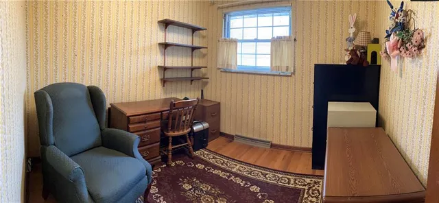 a bathroom with a sink mirror vanity and toilet