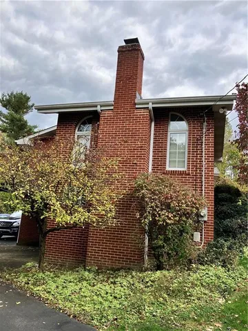 a view of a garden with pathway