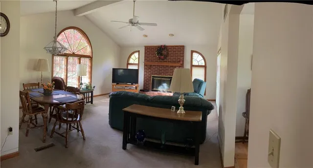 a bedroom with furniture and a window