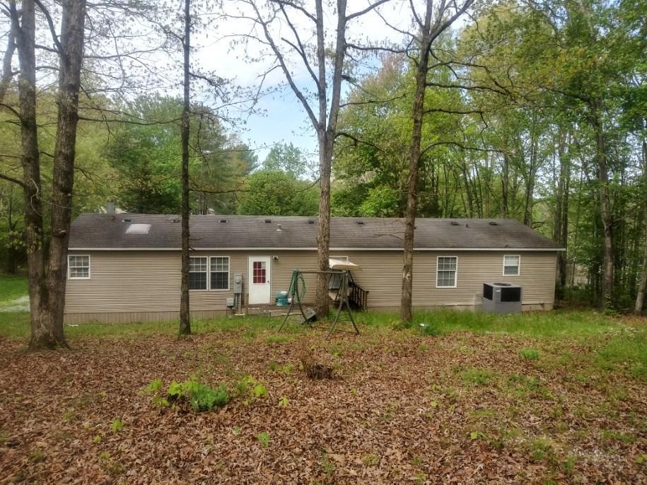 2401 Reed Springs Road Philadelphia, TN 37846 - Photo 3 of 20 front view of a house with a yard