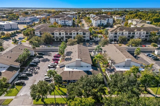 an aerial view of a city with lots of residential buildings