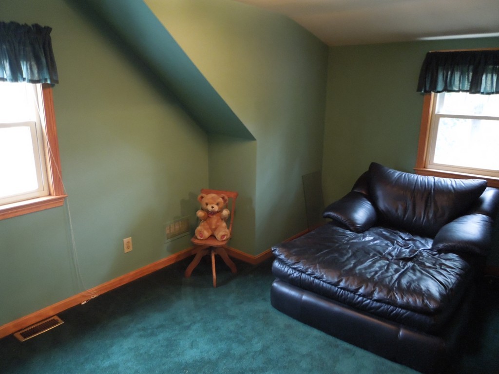 9 Meadowbrook Road Hudson, MA 01749 - Photo 14 of 18 a living room with furniture and a window