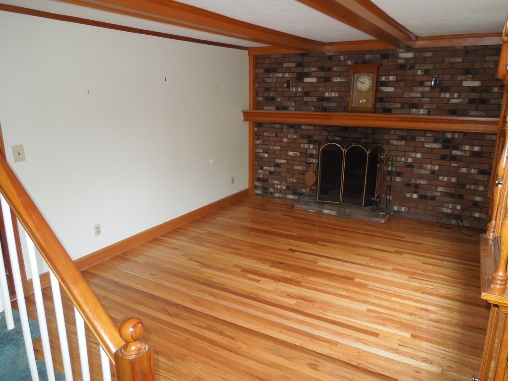 9 Meadowbrook Road Hudson, MA 01749 - Photo 4 of 18 a view of empty room with wooden floor