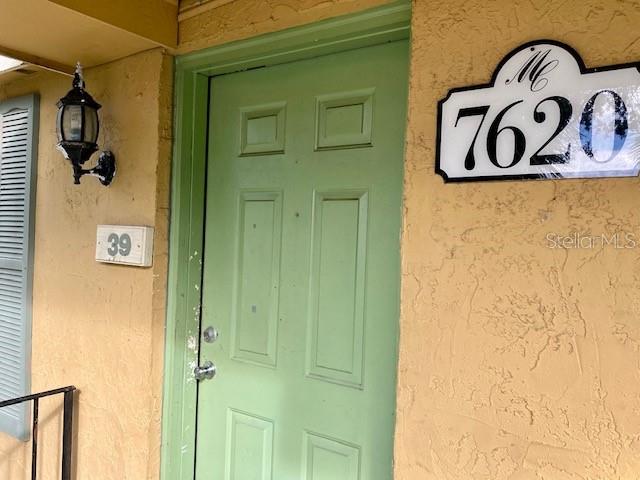 7620 Forest City Road, Unit G Orlando, FL 32810 - Photo 1 of 1 a bathroom with a shower and a mirror