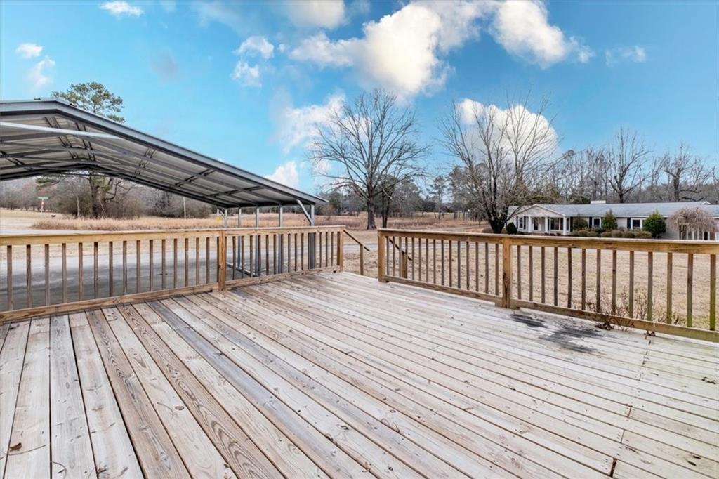 292 Ervin Coker Road Northeast Rome, GA 30161 - Photo 29 of 29 a view of deck with wooden floor and fence with wooden floor