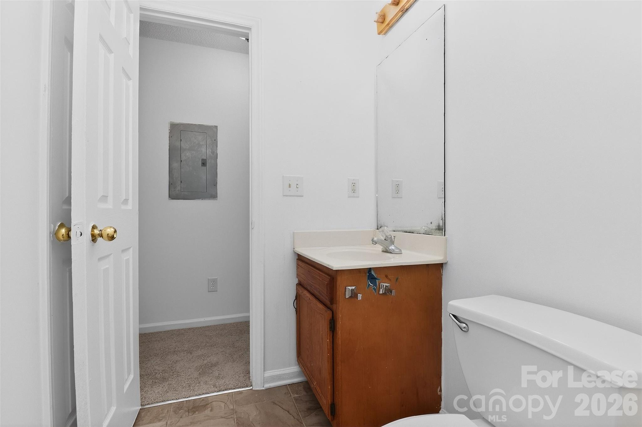 91-93 Sunderland Road Southwest, Unit 93 Concord, NC 28027 - Photo 21 of 30 a bathroom with a sink a toilet and shower