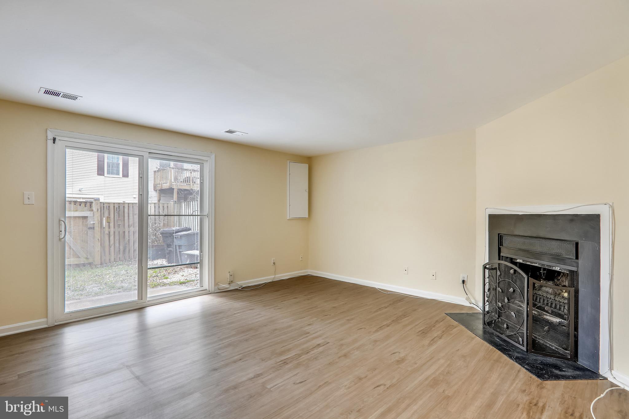 10600 Georgia Avenue Silver Spring, MD 20902 - Photo 29 of 44 Lower level rec-room (fireplace decorative only)