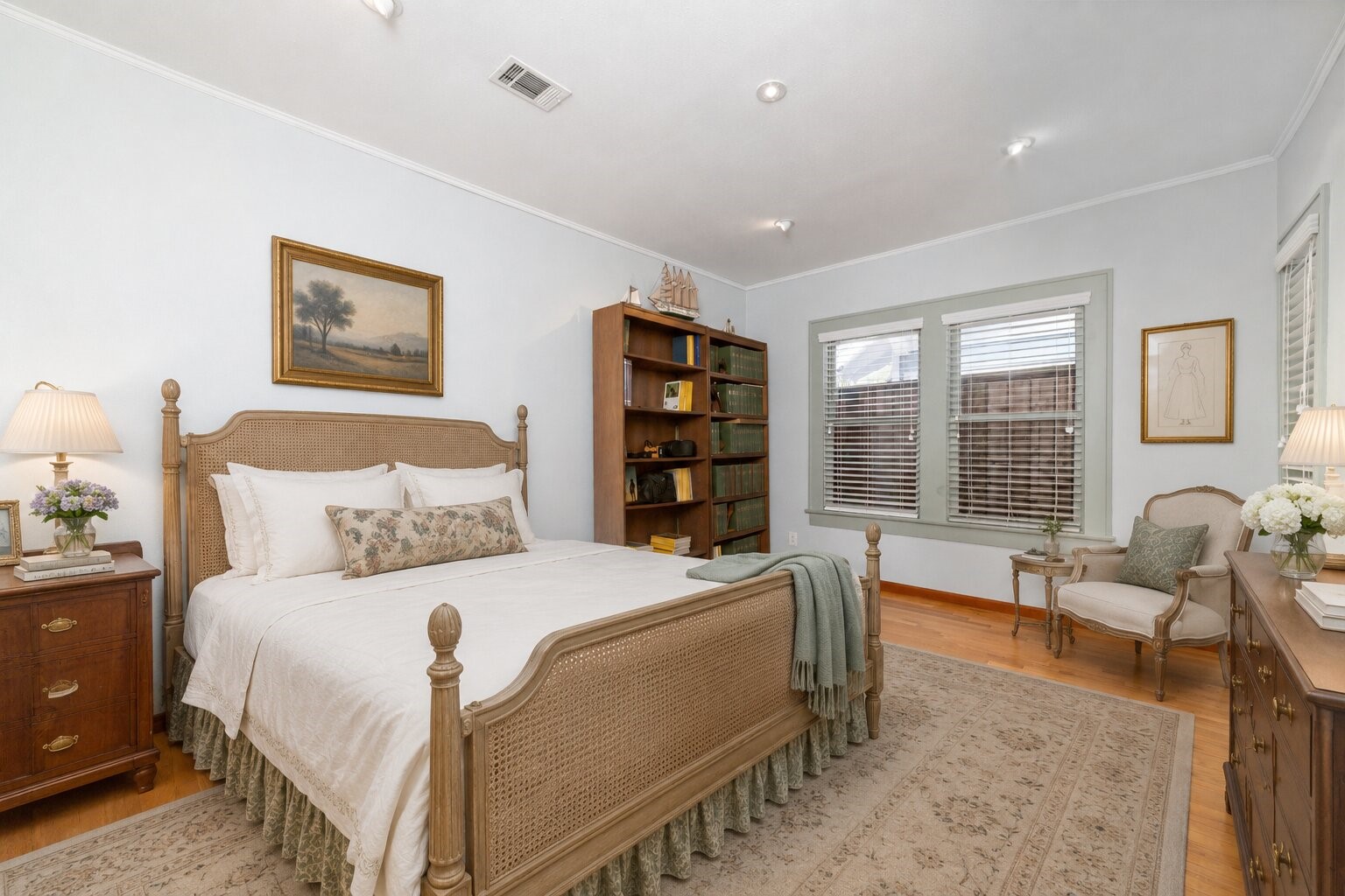 1613 California Street Houston, TX 77006 - Photo 24 of 50 Bathed in natural light, this inviting guest bedroom features original hardwood floors, generous windows, and the timeless character that defines this exceptional Craftsman home. (Virtually Staged)