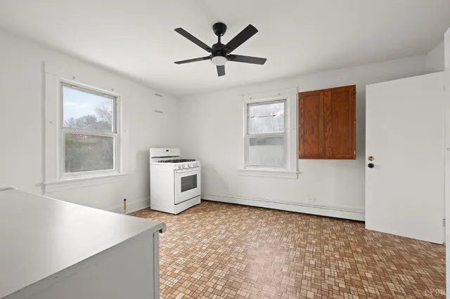 a view of cabinets and window