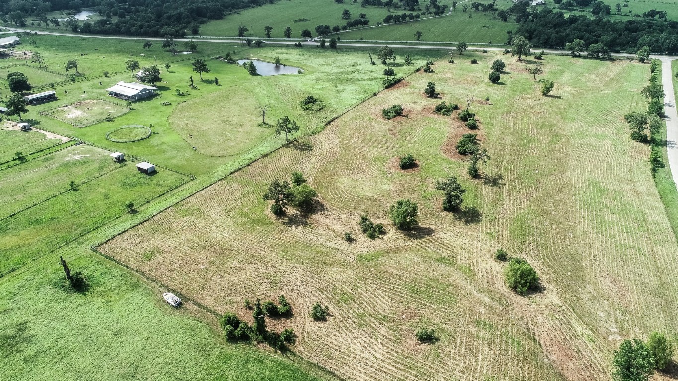 33083 Fm 1736 Road Hempstead, TX 77445 - Photo 14 of 20 a view of a water pond with a yard