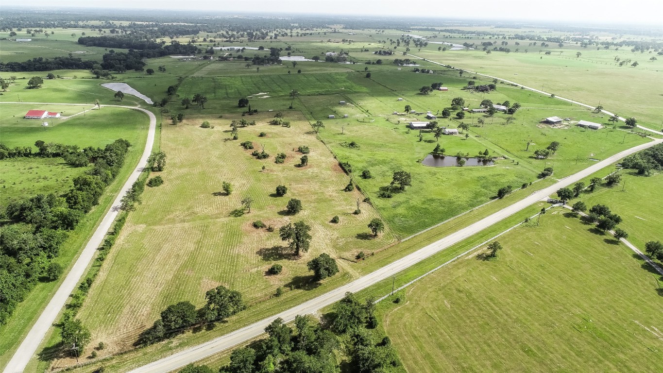 33083 Fm 1736 Road Hempstead, TX 77445 - Photo 16 of 20 an aerial view of lake residential houses with outdoor space