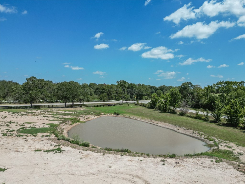 33083 Fm 1736 Road Hempstead, TX 77445 - Photo 20 of 20 a view of a lake with a big yard