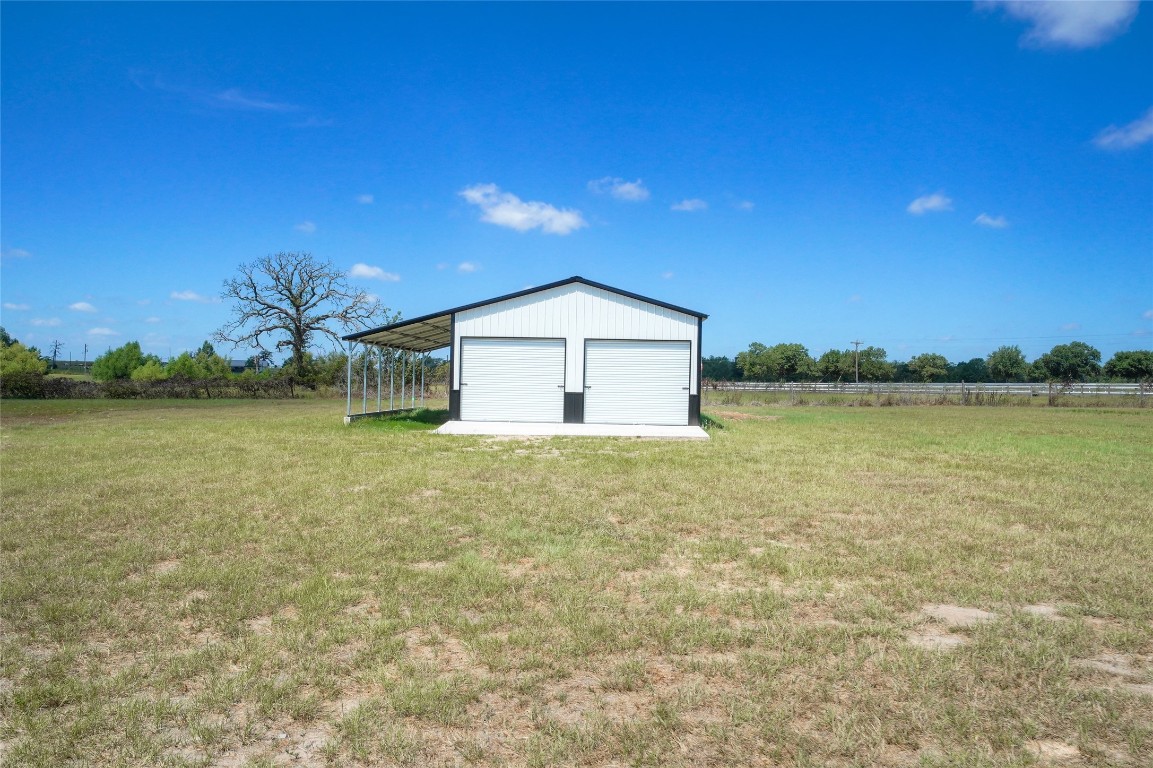 33083 Fm 1736 Road Hempstead, TX 77445 - Photo 6 of 20 a house with garden in front of it