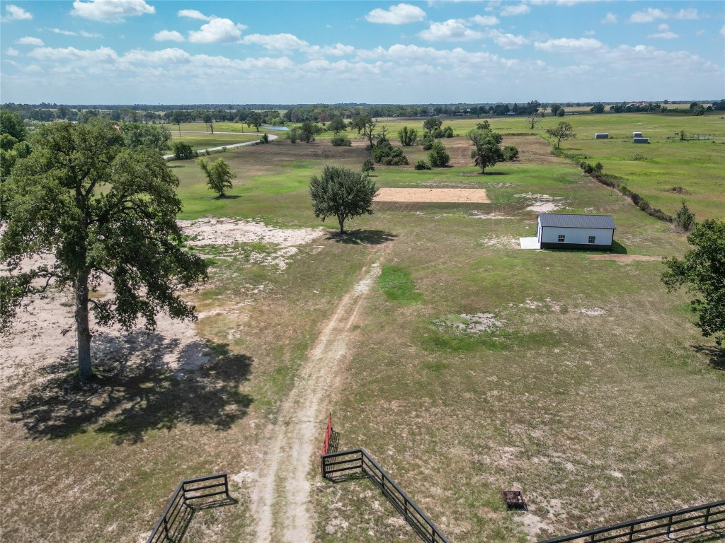 33083 Fm 1736 Road Hempstead, TX 77445 - Photo 8 of 20 a view of a lake with a houses