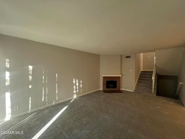 a view of a livingroom with a fireplace