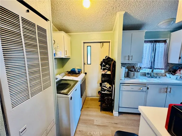 a bathroom with a sink double vanity granite and a mirror