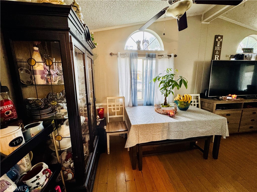 18540 Soledad Canyon Road, Unit 27 Canyon Country, CA 91351 - Photo 17 of 34 a view of a dining room with furniture and a window