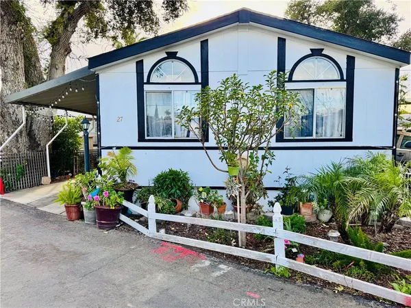 a front view of a house having yard