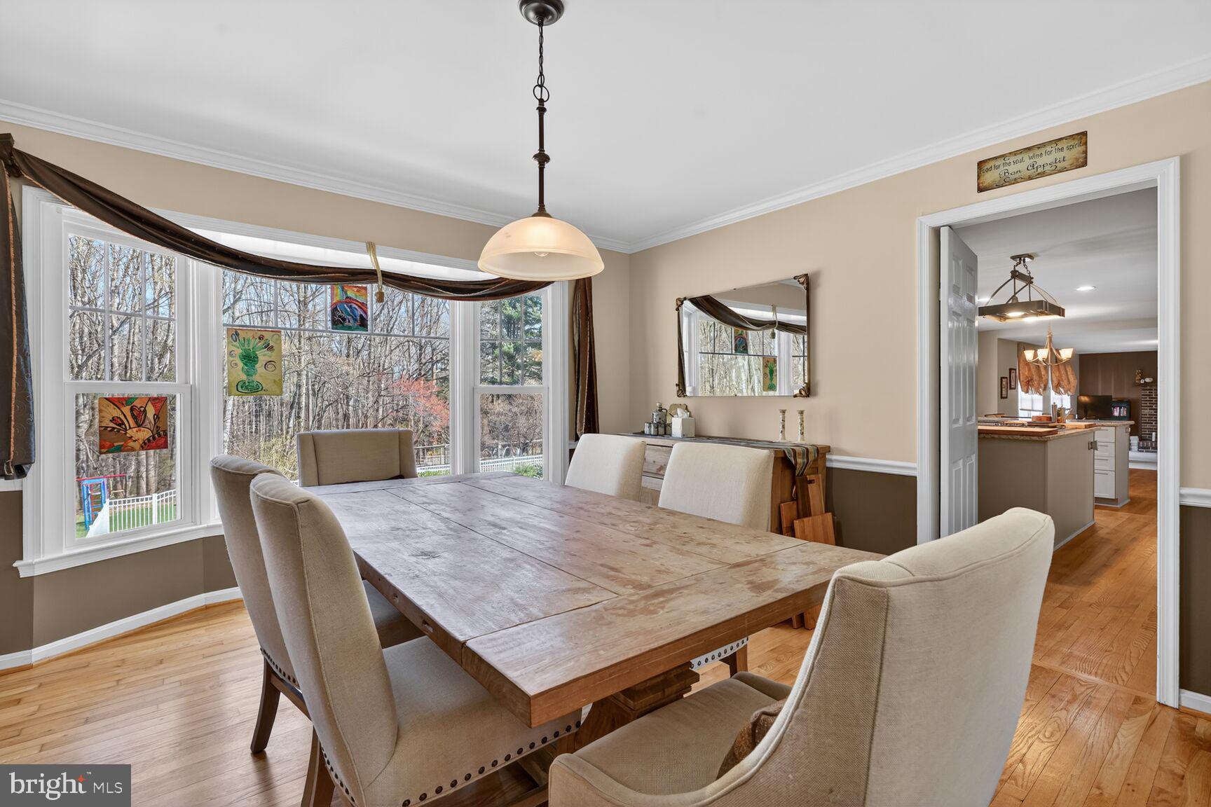 2036 Mayflower Drive Silver Spring, MD 20905 - Photo 16 of 48 a view of a dining room with furniture window and wooden floor