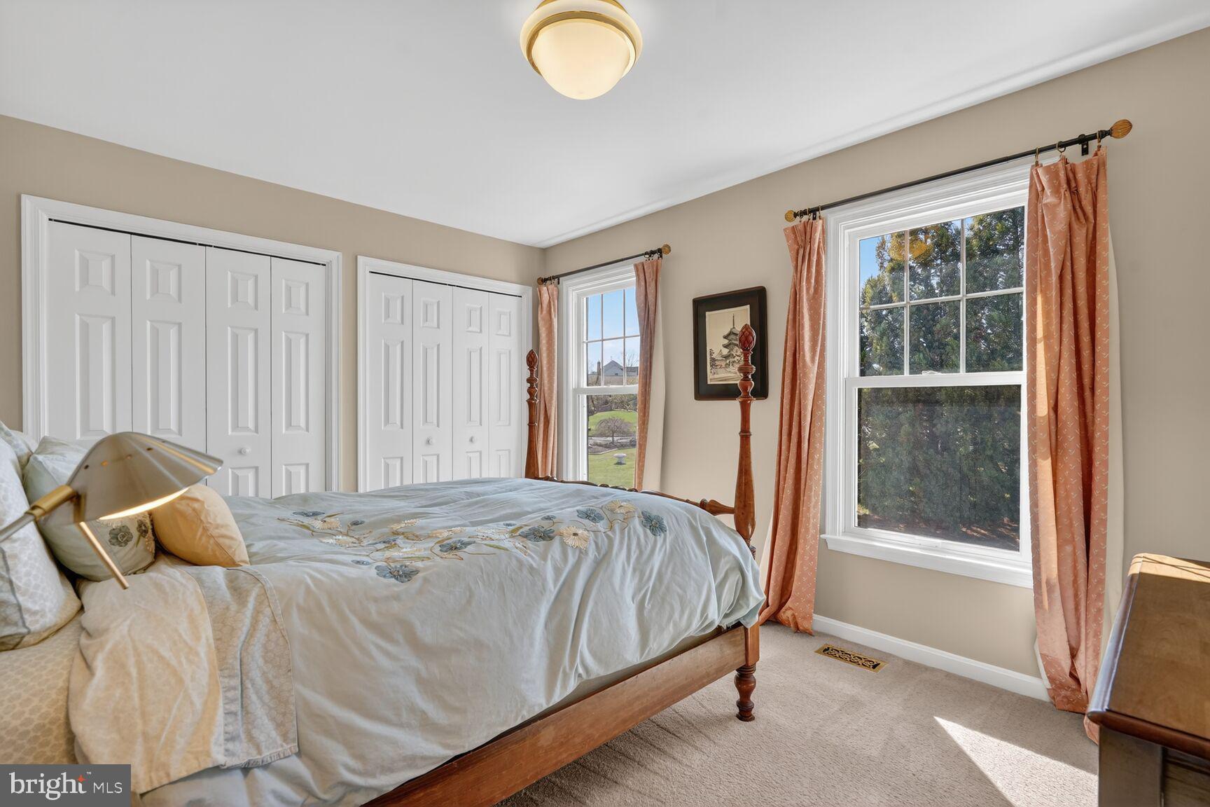 2036 Mayflower Drive Silver Spring, MD 20905 - Photo 30 of 48 a bedroom with a bed and a window