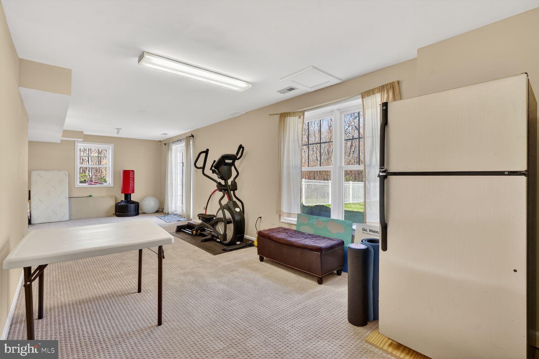 2036 Mayflower Drive Silver Spring, MD 20905 - Photo 37 of 48 a view of a room with gym equipment