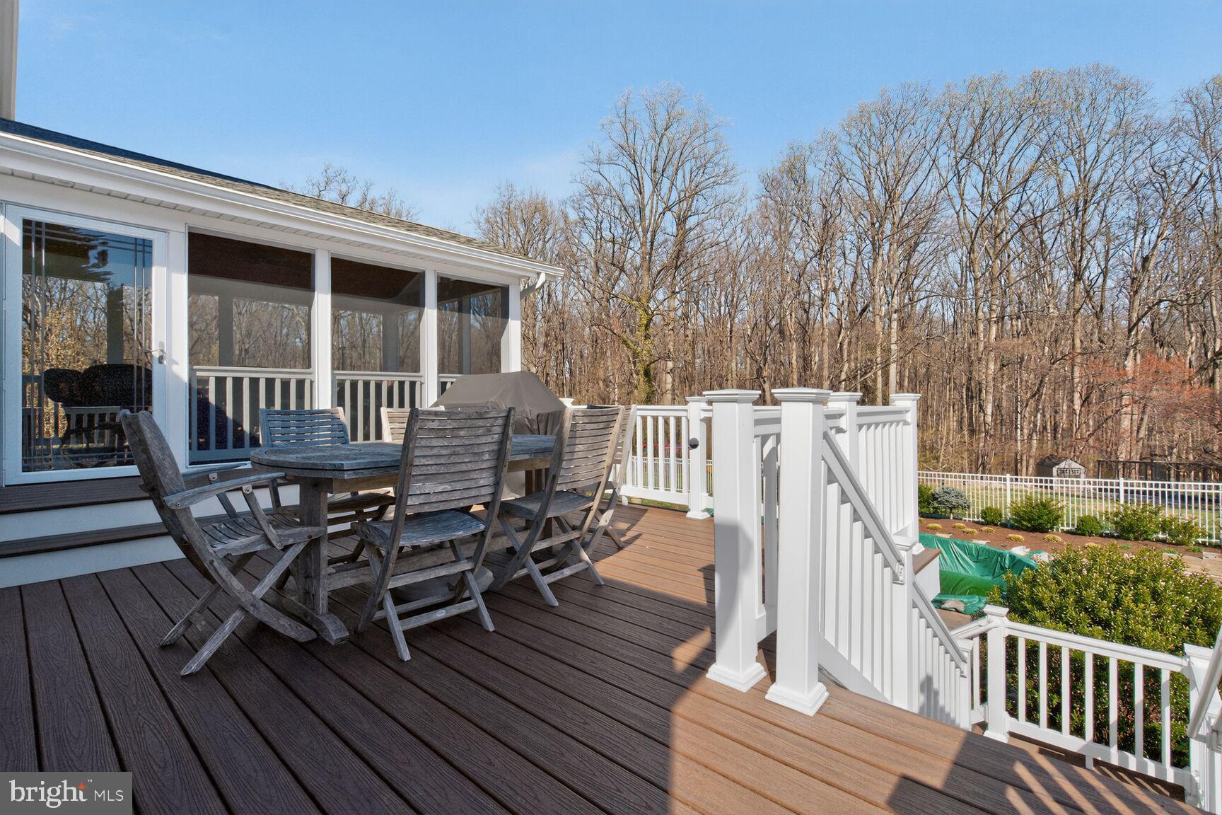 2036 Mayflower Drive Silver Spring, MD 20905 - Photo 42 of 48 a view of a roof deck with table and chairs