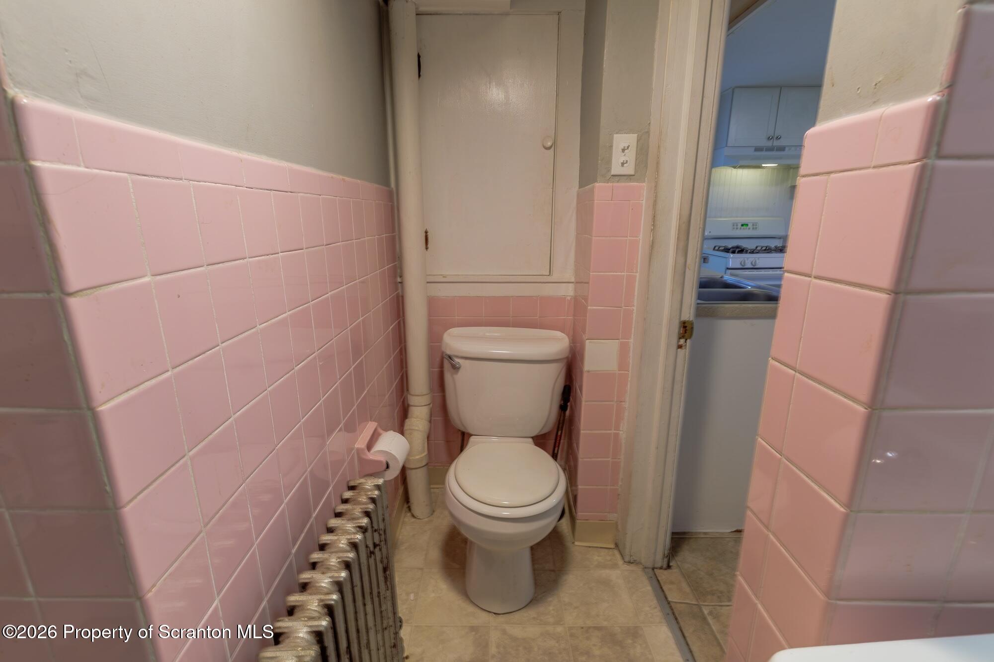 623 East Elm Street, Unit 1 Scranton, PA 18505 - Photo 13 of 15 a bathroom with a toilet and a shower