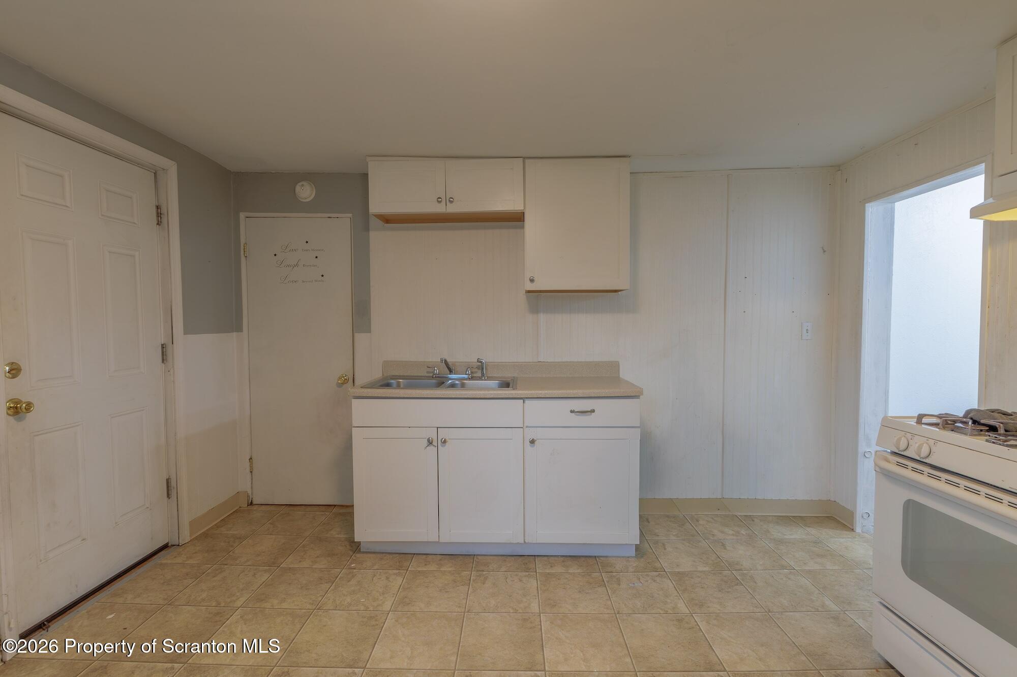 623 East Elm Street, Unit 1 Scranton, PA 18505 - Photo 9 of 15 a room with a sink cabinets and utility room