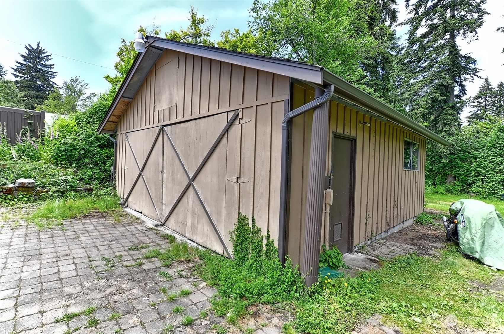 23720 Locust Way Bothell, WA 98021 - Photo 23 of 30 a view of barn house with a yard potted plants and a bench