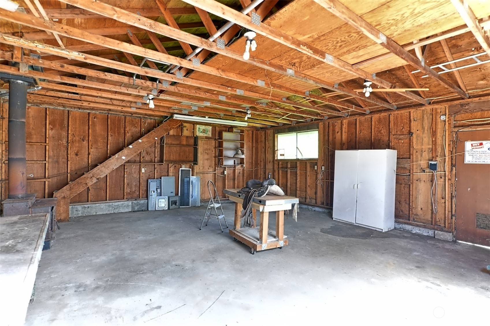 23720 Locust Way Bothell, WA 98021 - Photo 24 of 30 a view of an empty room with wooden walls