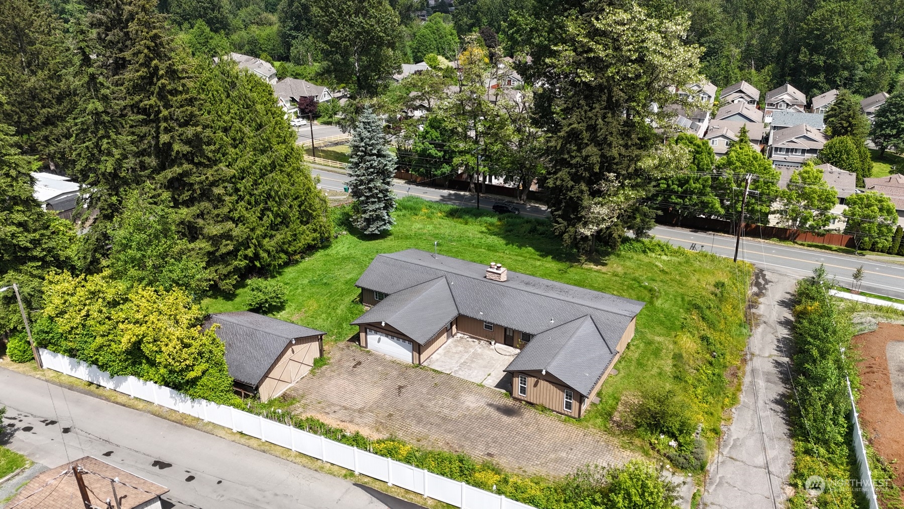 23720 Locust Way Bothell, WA 98021 - Photo 27 of 30 an aerial view of a house with garden space and street view