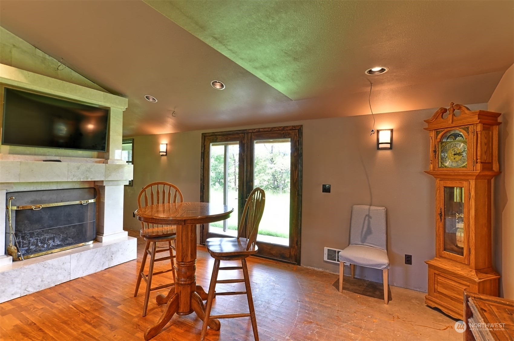 23720 Locust Way Bothell, WA 98021 - Photo 7 of 30 a view of a livingroom with furniture and a fireplace