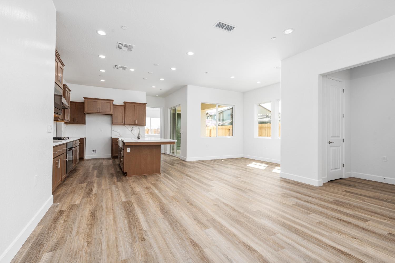276 Huckleberry Lane South Madera, CA 93636 - Photo 15 of 32 a view of kitchen with sink and refrigerator