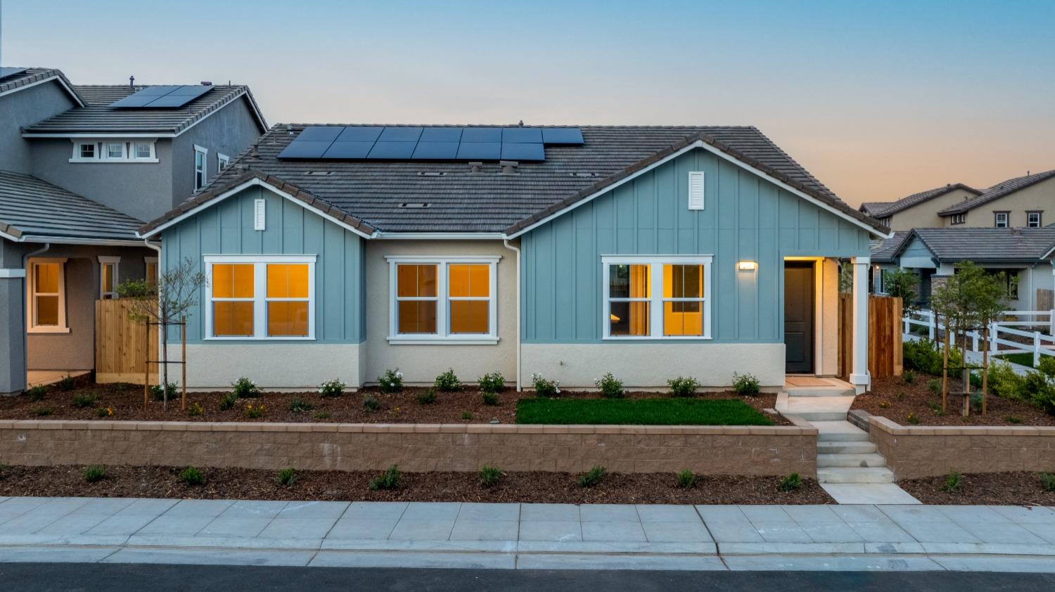 276 Huckleberry Lane South Madera, CA 93636 - Photo 2 of 32 a front view of a house with a yard