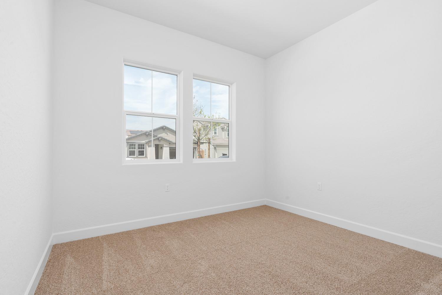 276 Huckleberry Lane South Madera, CA 93636 - Photo 22 of 32 an empty room with a window