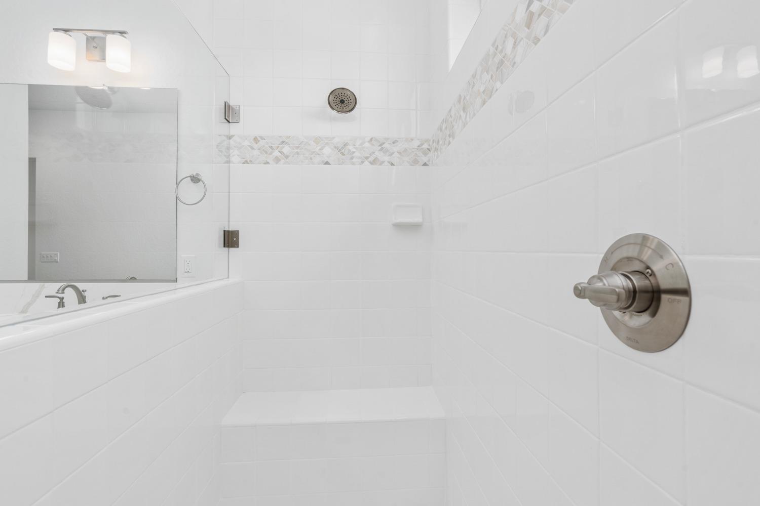 276 Huckleberry Lane South Madera, CA 93636 - Photo 26 of 32 a bathroom with a tub and a shower