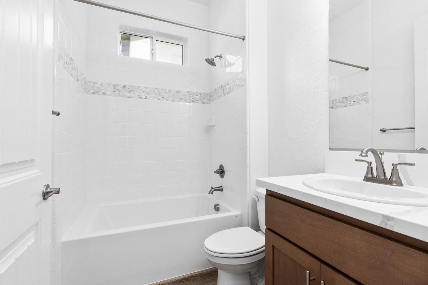 276 Huckleberry Lane South Madera, CA 93636 - Photo 30 of 32 a bathroom with a sink a toilet and shower
