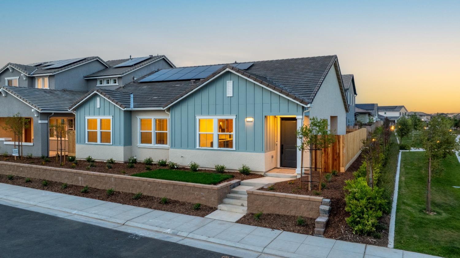 276 Huckleberry Lane South Madera, CA 93636 - Photo 4 of 32 a front view of a house with a yard