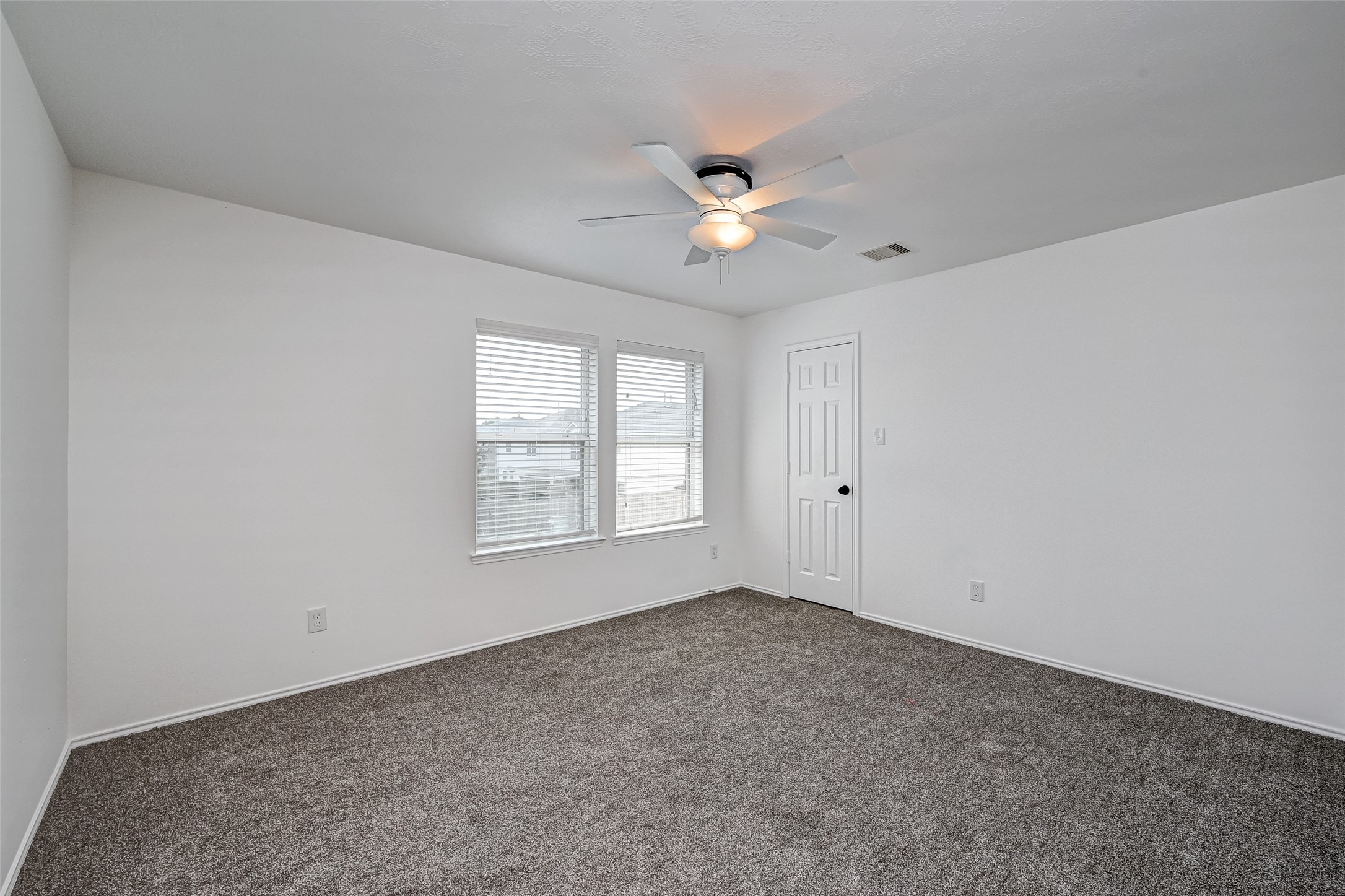 6906 Anson Point Lane Houston, TX 77040 - Photo 18 of 31 a view of an empty room with a window
