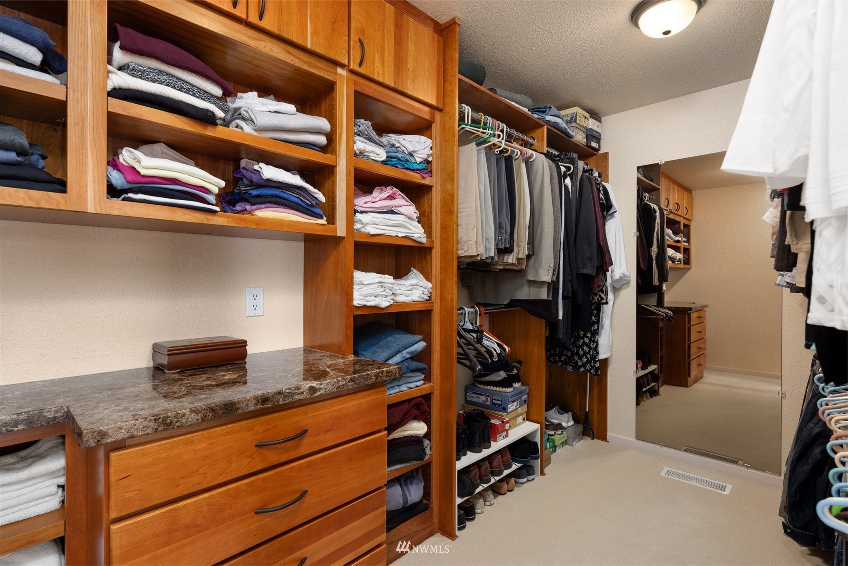 627 Briar Road Bellingham, WA 98225 - Photo 17 of 40 a view of walk in closet with clothes and shoes